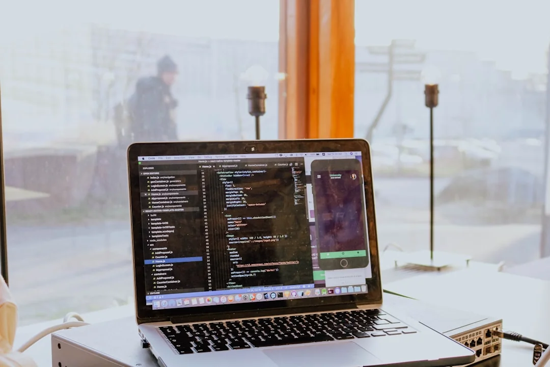 OpenAI Website with Introduction to ChatGPT on Computer Monitor